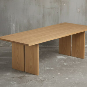 Minimalist solid wood dining table with architectural slab legs